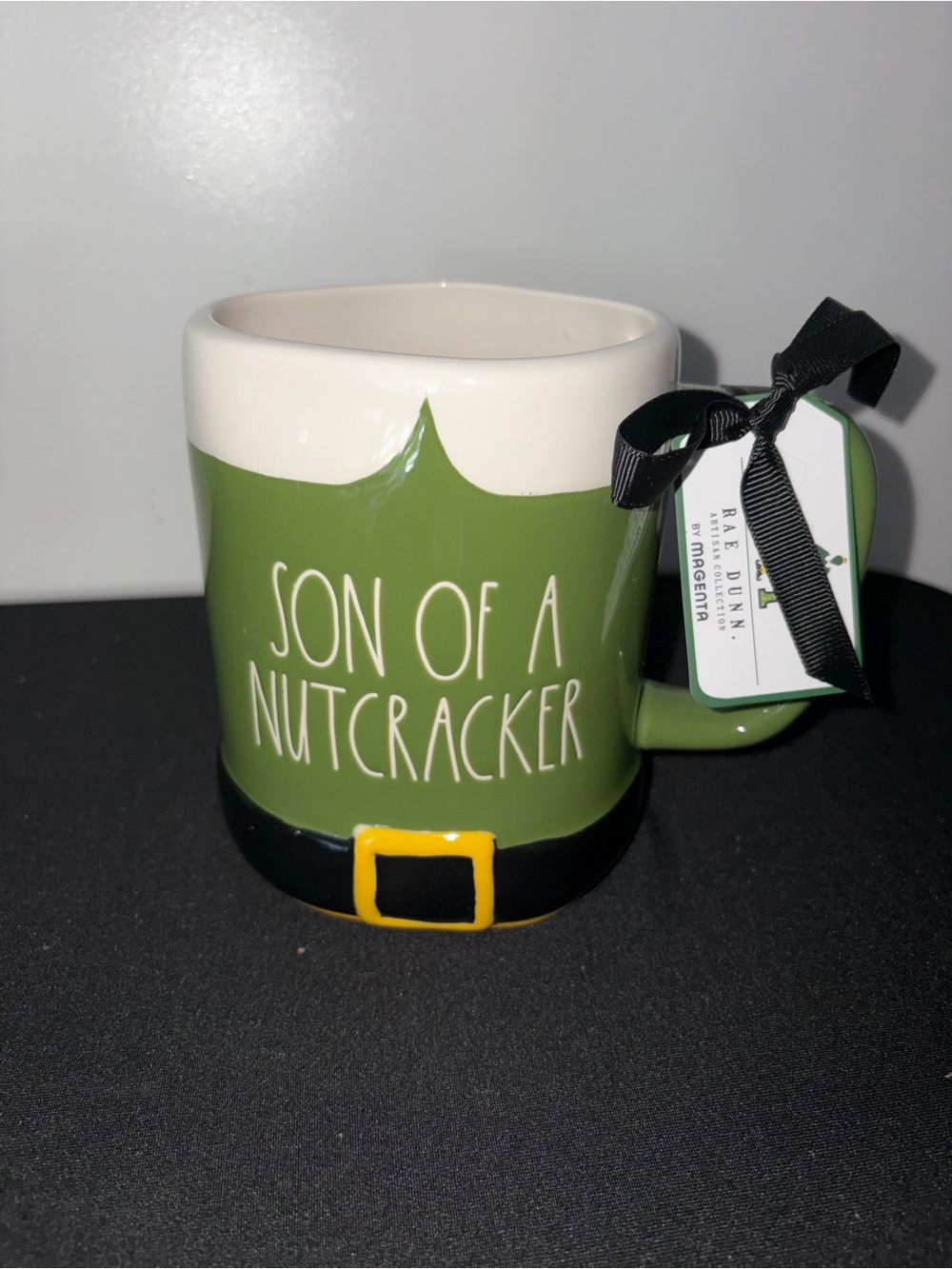 Rae Dunn Green "Son of a Nutcracker" Holiday Mug with Yellow Belt Accent